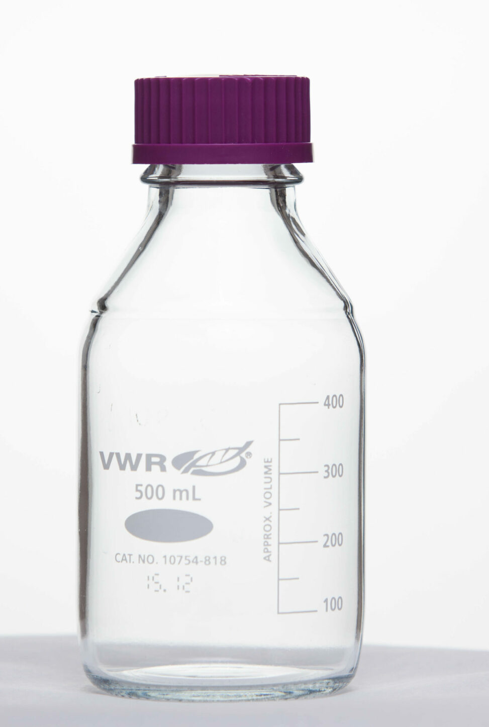 A 500 ml glass bottle with a purple lid.