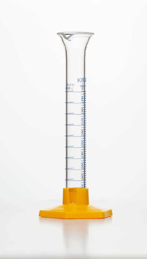 A glass graduated cylinder held upright by a orange stand attached to the bottom.